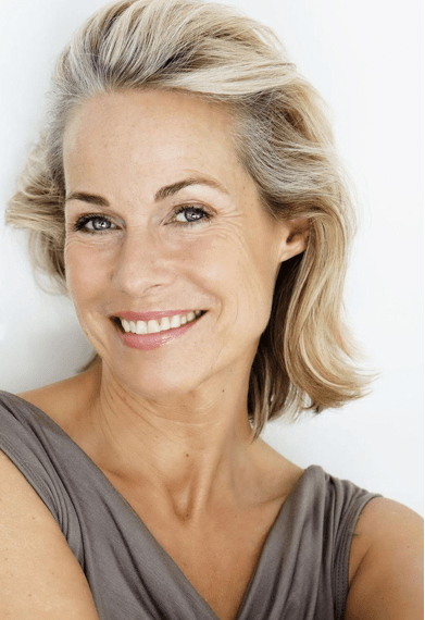 photo of smiling woman for Eighty-One Medical